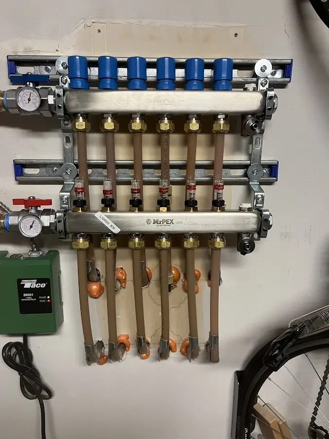 Plumber performing Gas Leak Detection at a residential property in Hartland